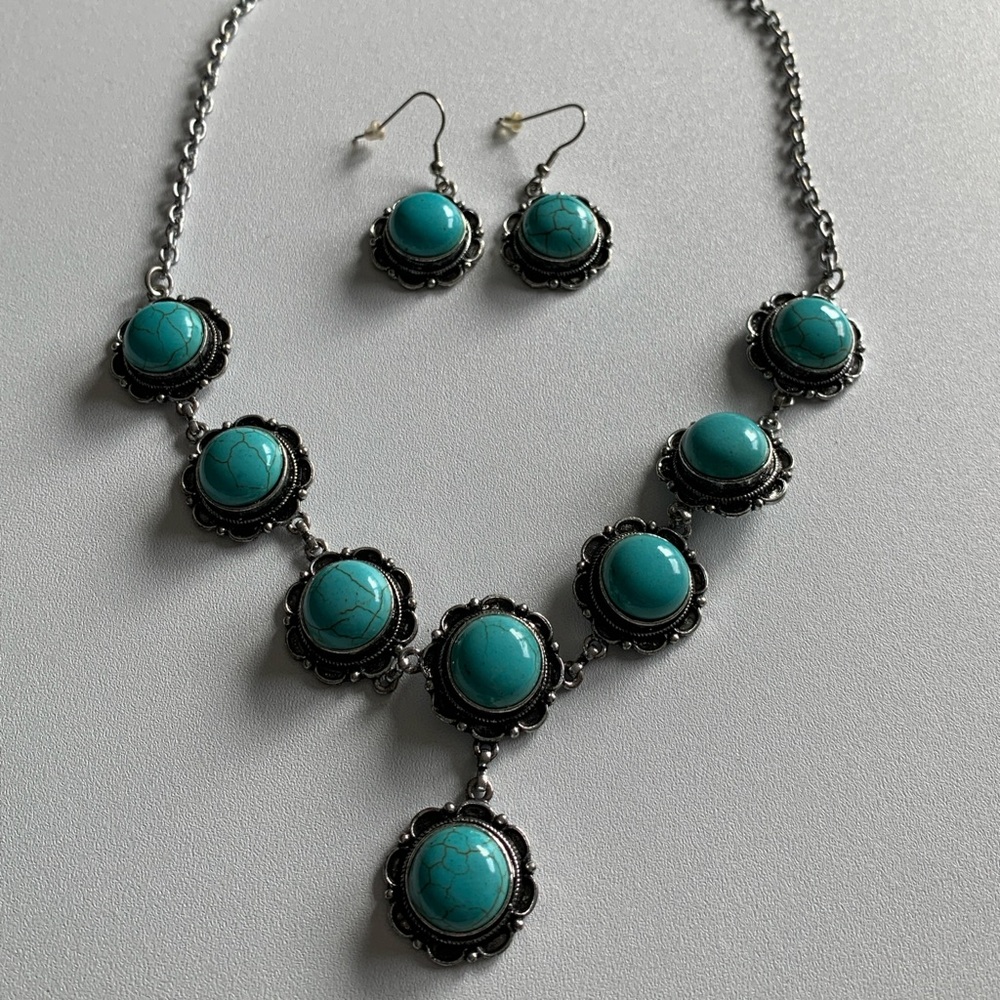 Southwestern style turquoise dyed howlite with silver tone metal. NWT